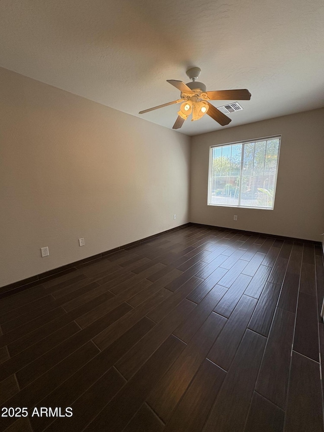 33512 N 24th Ln, Phoenix, AZ 85085 - unfurnished room featuring ceiling fan, dark wood-style flooring, and baseboards