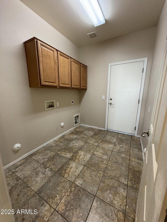 33512 N 24th Ln, Phoenix, AZ 85085 - laundry area with hookup for a gas dryer, washer hookup, hookup for an electric dryer, cabinet space, and baseboards