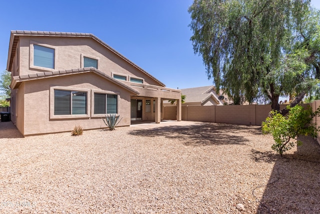 33512 N 24th Ln, Phoenix, AZ 85085 - rear view of house featuring stucco siding, a fenced backyard, and a patio area