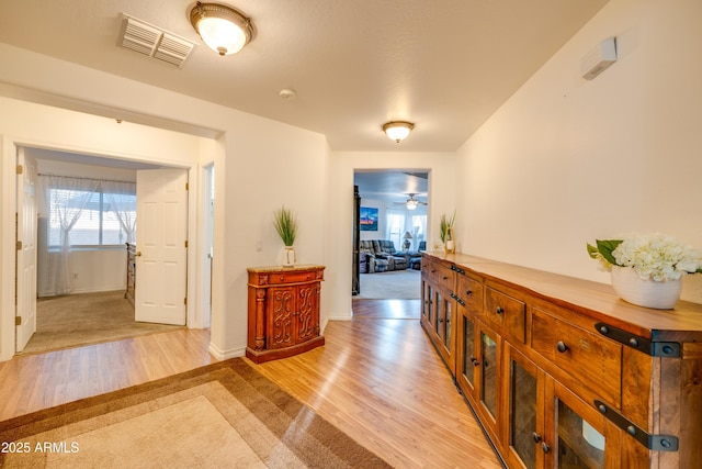 hallway featuring light hardwood / wood-style floors