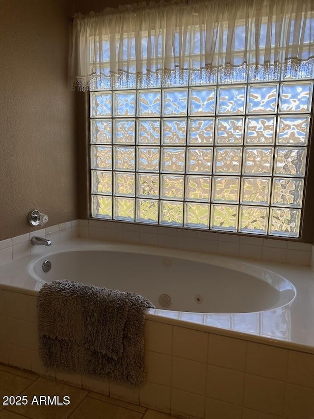 full bath with a jetted tub