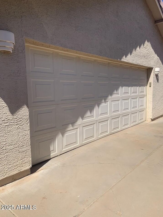 garage with driveway