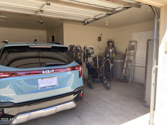 garage featuring water heater