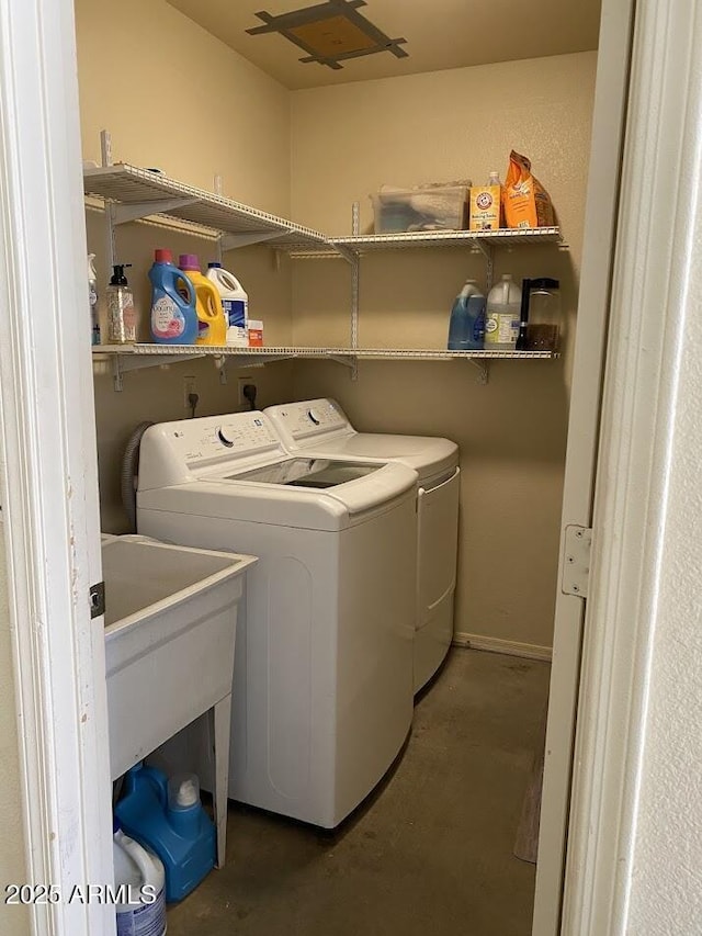 laundry room with laundry area and washing machine and dryer