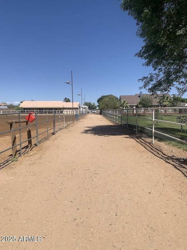 view of home's community featuring a rural view