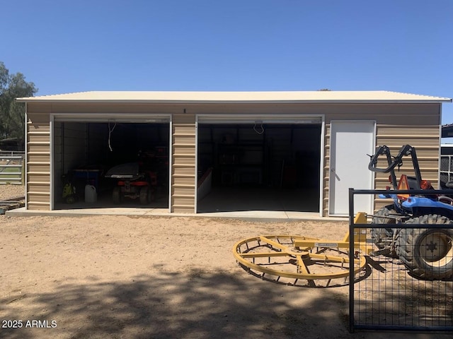 garage featuring fence