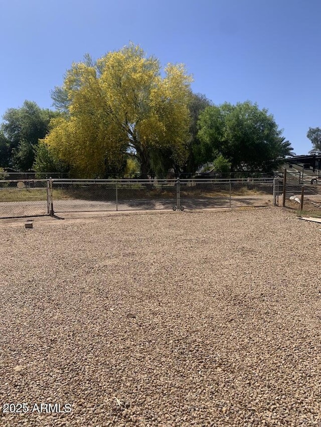 view of property's community featuring fence
