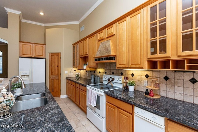 kitchen featuring custom range hood, ornamental molding, sink, light tile patterned floors, and white appliances