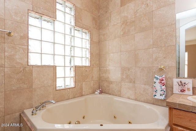 bathroom featuring a bathtub and vanity