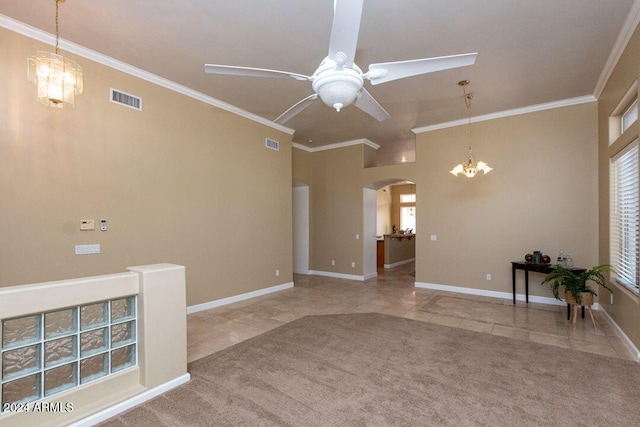 interior space featuring ornamental molding, light colored carpet, and ceiling fan