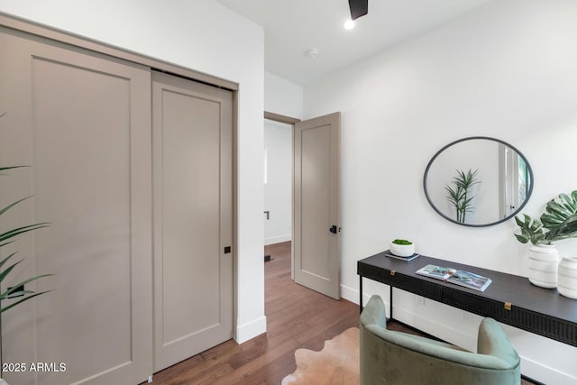 hallway featuring wood-type flooring