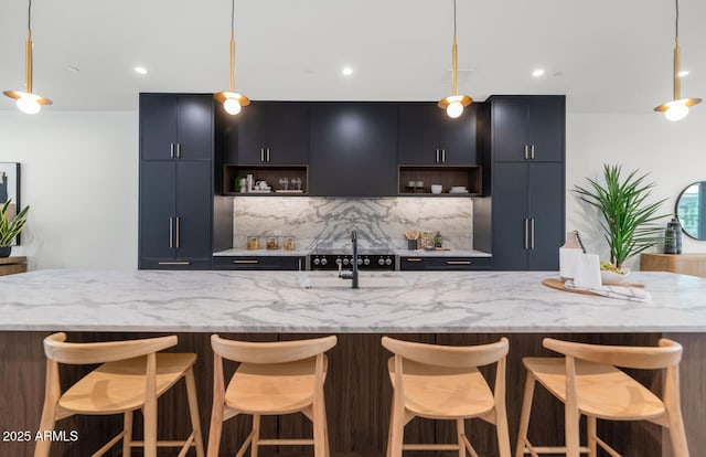 kitchen with decorative light fixtures and a large island