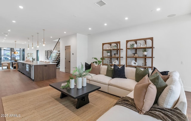 living room with light hardwood / wood-style floors