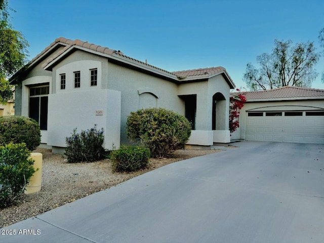 view of side of property featuring a garage