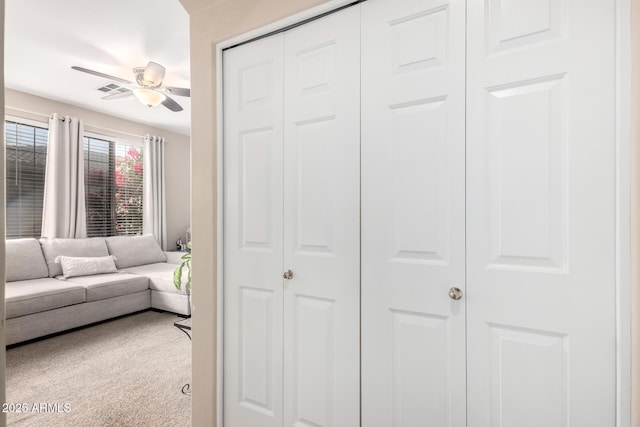 interior space featuring ceiling fan