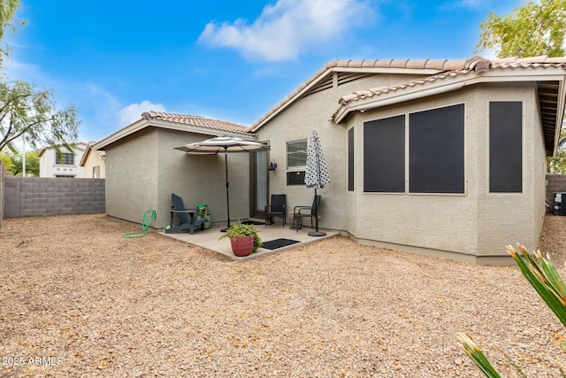 rear view of property with a patio area