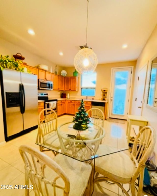 dining area with light tile patterned floors