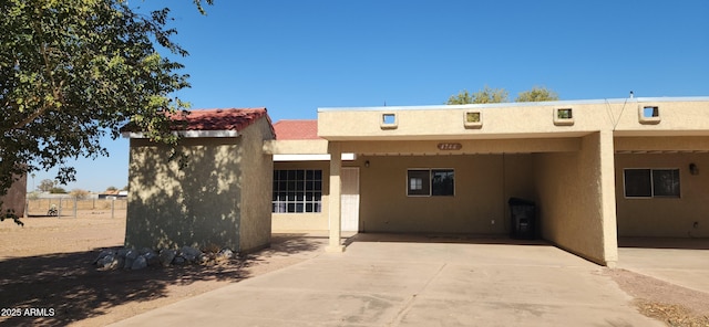 view of front of house with a carport