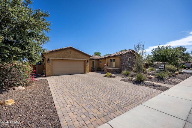 view of front of property with a garage