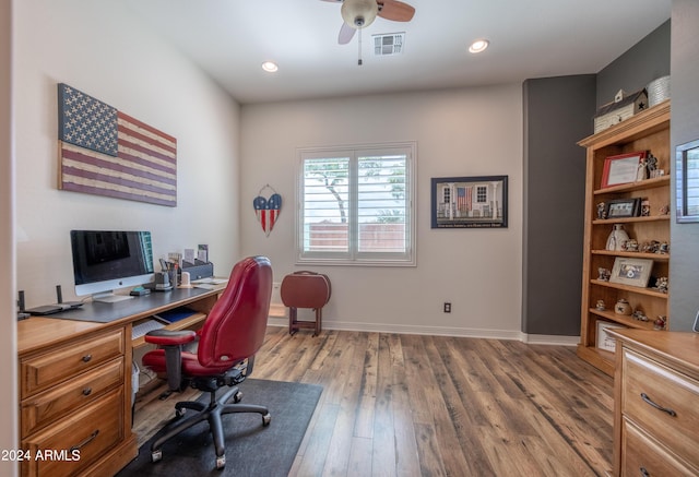 office featuring hardwood / wood-style flooring and ceiling fan