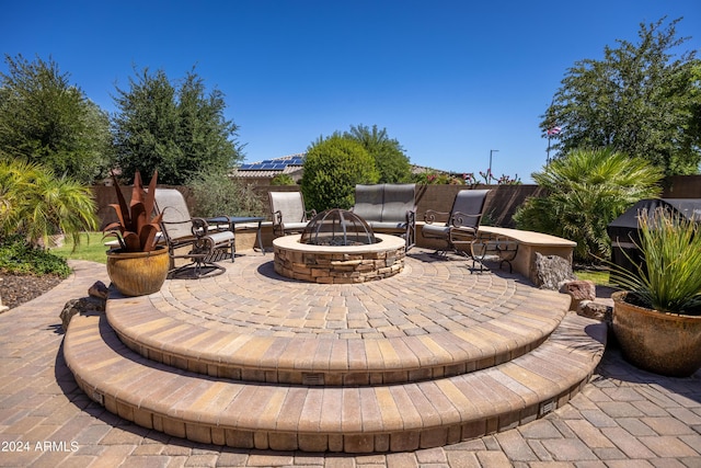 view of patio / terrace featuring a fire pit