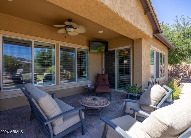 view of patio with ceiling fan