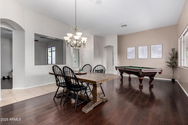 dining room with hardwood / wood-style flooring and billiards