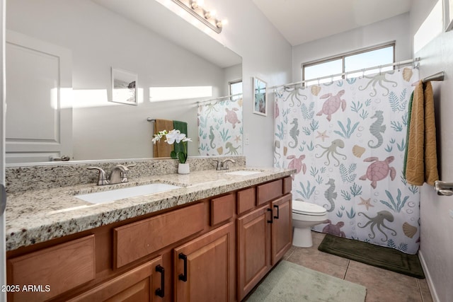 bathroom with vanity, curtained shower, tile patterned floors, and toilet