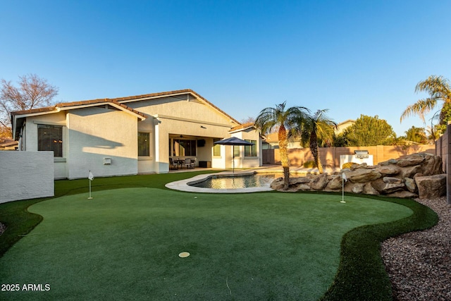 rear view of house featuring a patio area