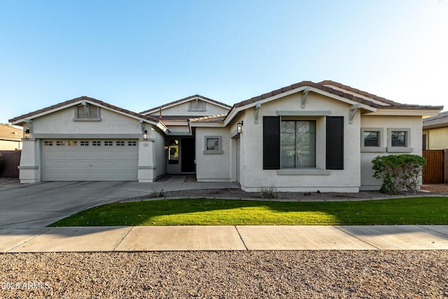 ranch-style house featuring a garage