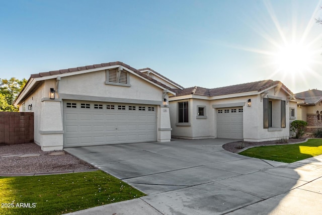 single story home featuring a garage