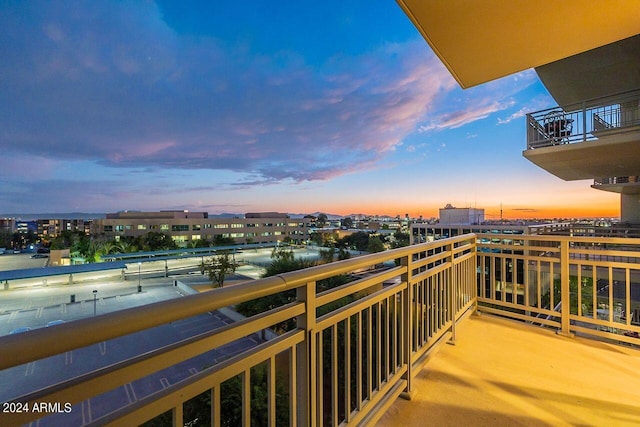 view of balcony at dusk