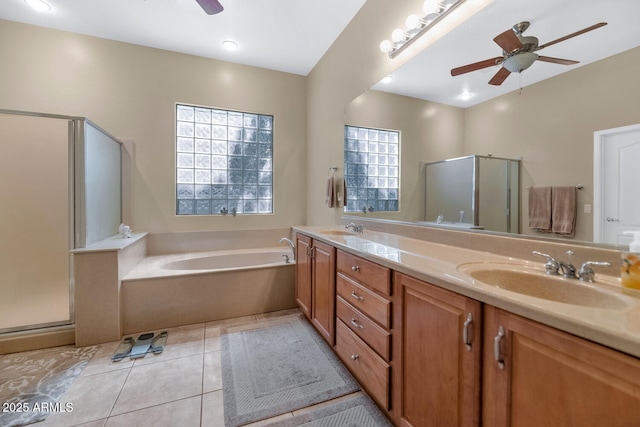 6133 W Fetlock Ter, Phoenix, AZ 85083 - full bath featuring a ceiling fan, a stall shower, a garden tub, double vanity, and tile patterned flooring