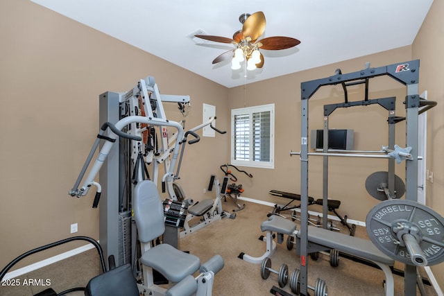 6133 W Fetlock Ter, Phoenix, AZ 85083 - exercise room featuring ceiling fan, baseboards, and carpet flooring