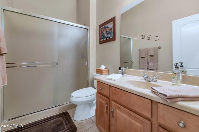 6133 W Fetlock Ter, Phoenix, AZ 85083 - bathroom with tile patterned floors, a stall shower, vanity, and toilet