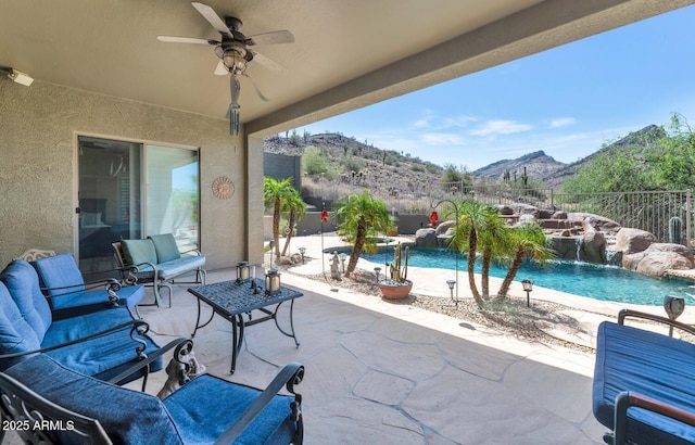6133 W Fetlock Ter, Phoenix, AZ 85083 - view of patio featuring a mountain view, a ceiling fan, and a fenced backyard