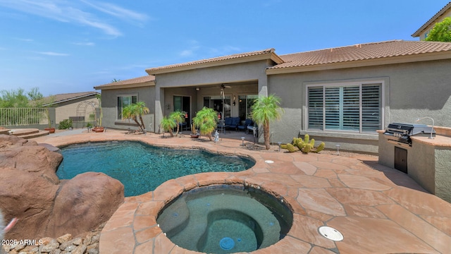 6133 W Fetlock Ter, Phoenix, AZ 85083 - view of pool featuring exterior kitchen, an in-ground hot tub, a patio area, a grill, and ceiling fan