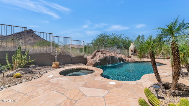 6133 W Fetlock Ter, Phoenix, AZ 85083 - view of swimming pool featuring an in-ground hot tub, fence, and a patio area