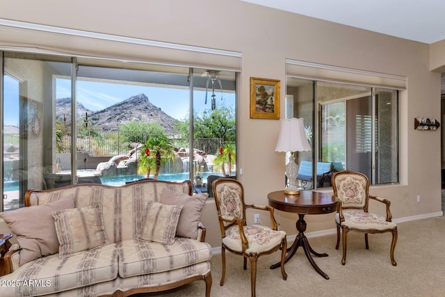 6133 W Fetlock Ter, Phoenix, AZ 85083 - living room with a mountain view, carpet, plenty of natural light, and baseboards