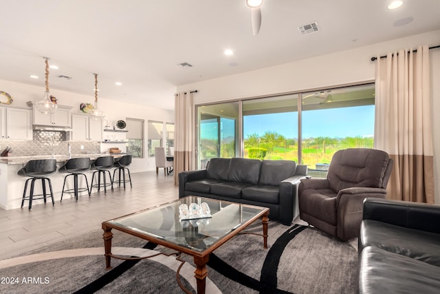 17756 E Silver Sage Ln, Rio Verde, AZ 85263 - living room with recessed lighting, wood finished floors, and a ceiling fan