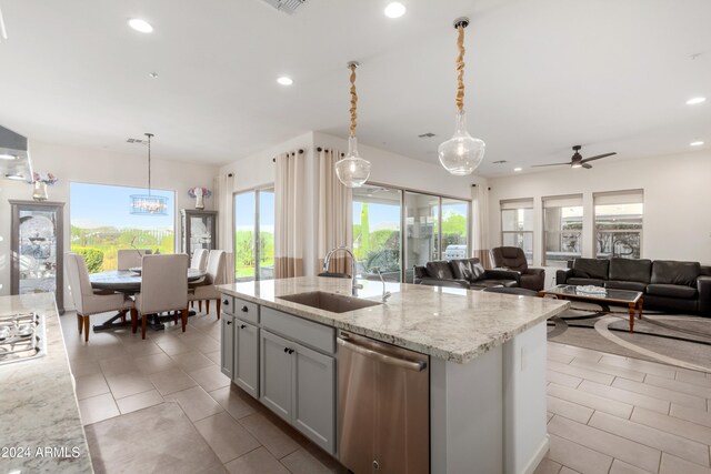17756 E Silver Sage Ln, Rio Verde, AZ 85263 - kitchen featuring a sink, stainless steel appliances, recessed lighting, healthy amount of natural light, and a kitchen island with sink