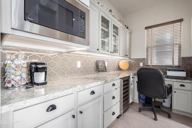 17756 E Silver Sage Ln, Rio Verde, AZ 85263 - office area featuring wine cooler and light tile patterned flooring