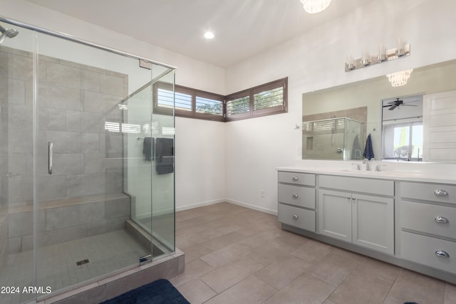 17756 E Silver Sage Ln, Rio Verde, AZ 85263 - bathroom with a ceiling fan, a stall shower, vanity, baseboards, and tile patterned floors