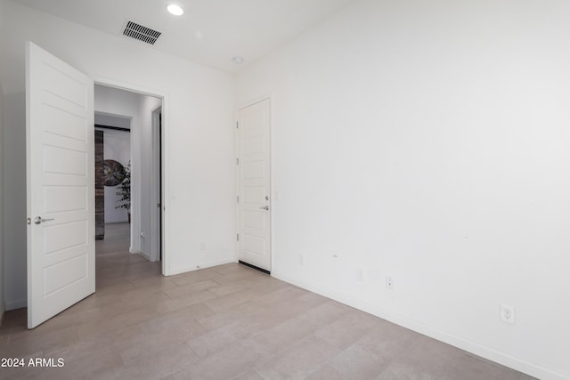 17756 E Silver Sage Ln, Rio Verde, AZ 85263 - unfurnished bedroom featuring baseboards and recessed lighting