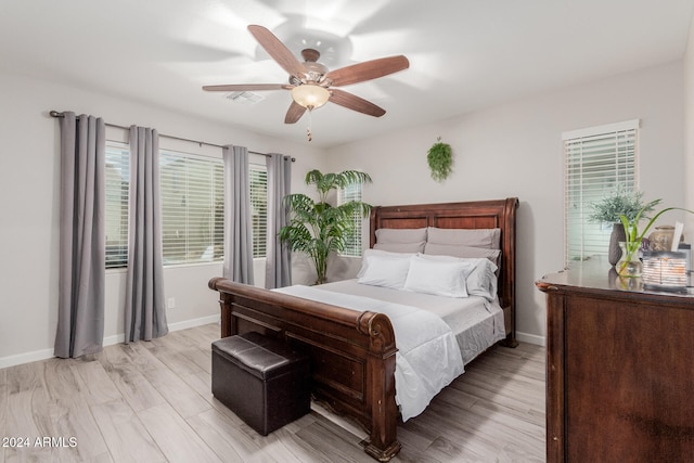 bedroom featuring ceiling fan and light wood-type flooring