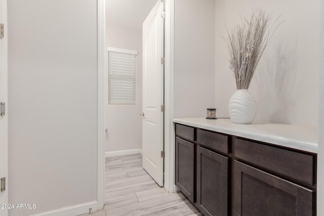 corridor featuring light hardwood / wood-style flooring