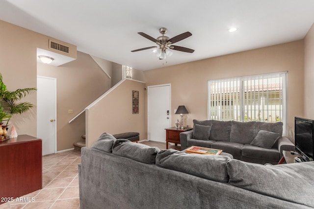 2941 N Oregon St Unit 12, Chandler, AZ 85225 - living area featuring stairs, ceiling fan, and light tile patterned floors