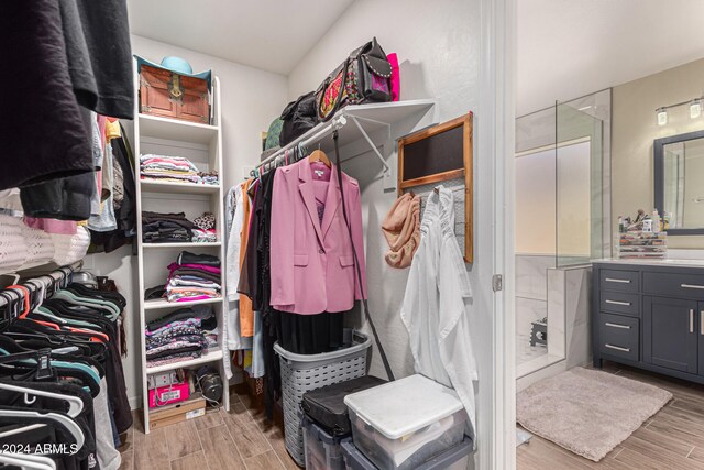 walk in closet featuring light wood-type flooring