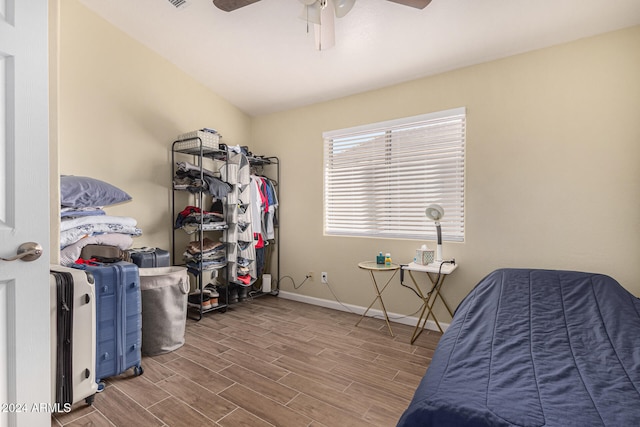 bedroom featuring hardwood / wood-style flooring and ceiling fan