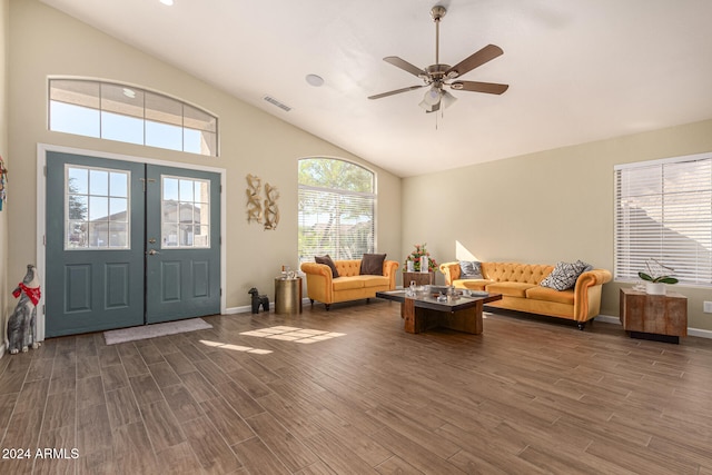 living room featuring ceiling fan, high vaulted ceiling, plenty of natural light, and dark hardwood / wood-style floors